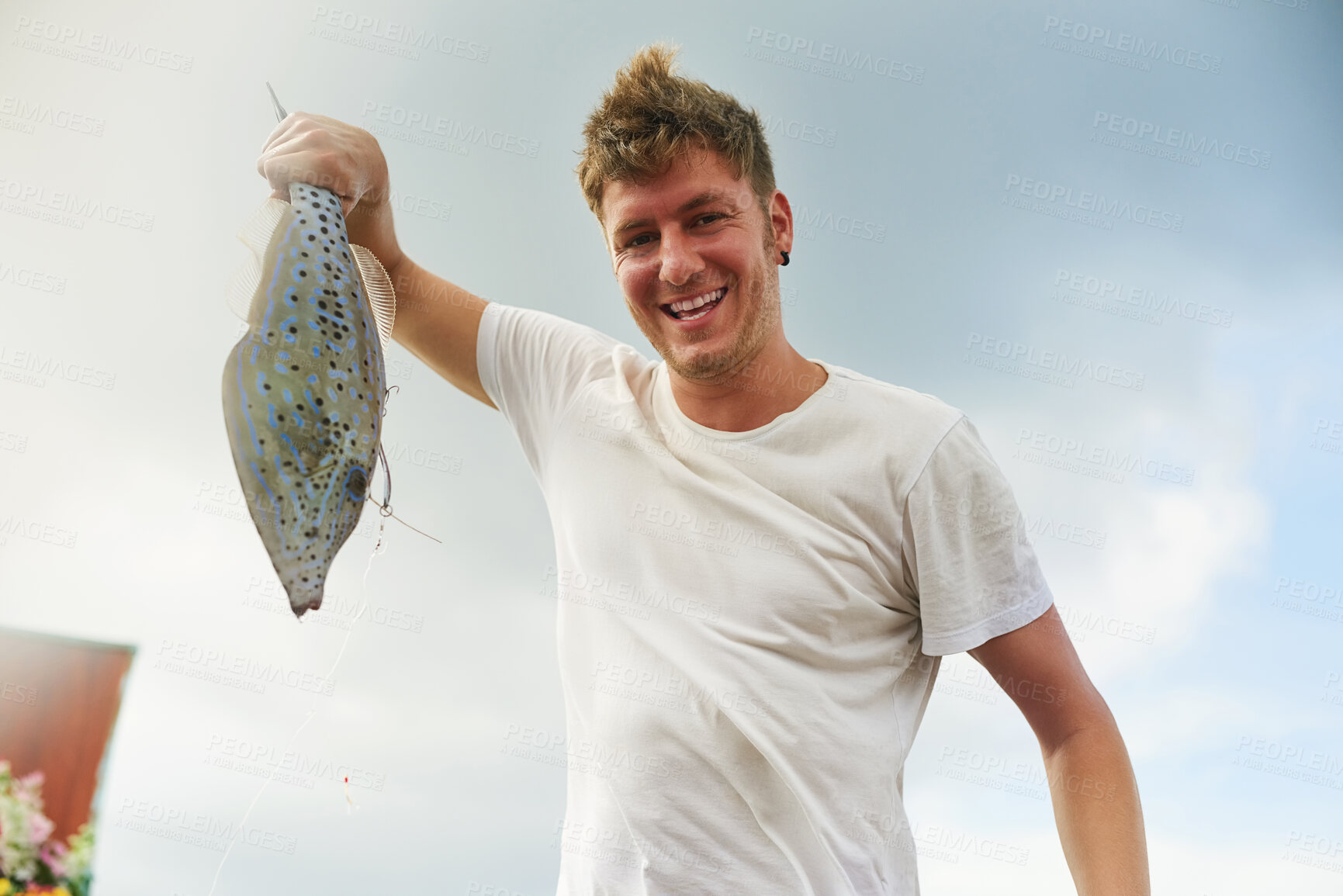 Buy stock photo Happy, fish and fisherman in portrait by sea on adventure, weekend holiday and vacation in Thailand. Outdoor, blue sky and guy with water mammal, animal and fishing as hobby or activity to relax