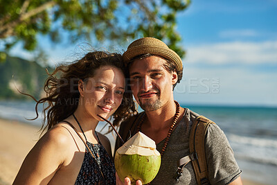 Buy stock photo Travel, portrait and couple with cocktail by beach for outdoor adventure, romance and tourist vacation. Happy, man and woman with tropical drink by sea for commitment, love and anniversary in Brazil