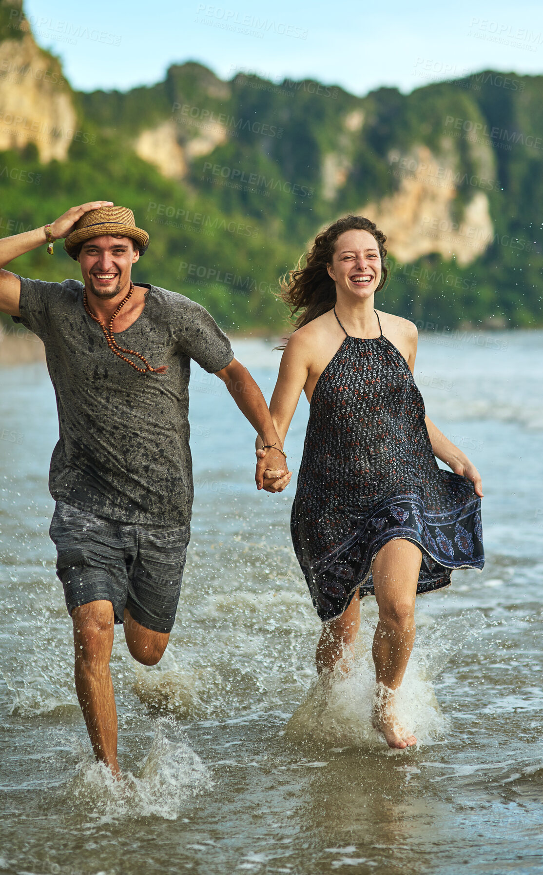 Buy stock photo Beach, couple holding hands and running in water for fun, vacation or tropical adventure in nature. Outdoor, travel and happy man with woman by ocean for holiday, romantic date or freedom in Bali