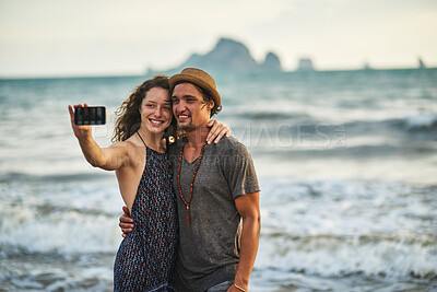 Buy stock photo Selfie, couple and hug at beach on vacation, social media and travel to Bali for profile picture. People, relax and  photography in outdoor nature with love and together for memory by ocean.