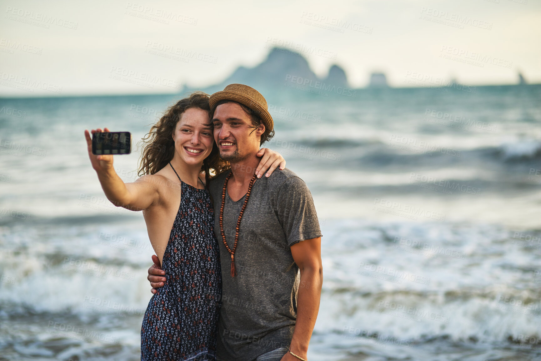 Buy stock photo Selfie, couple and hug at beach on vacation, social media and travel to Bali for profile picture. People, relax and  photography in outdoor nature with love and together for memory by ocean.