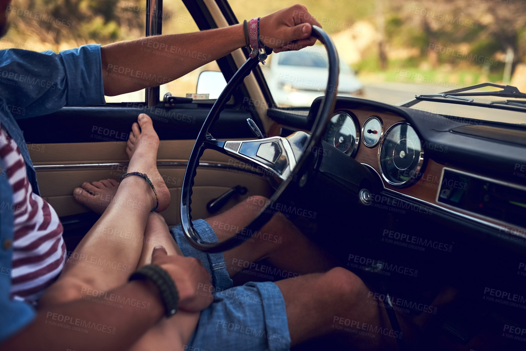 Buy stock photo Relax, hands or feet of couple on road trip for holiday travel or driving on vacation in countryside. Wellness, transport or people in car with love, romance or support together for adventure journey