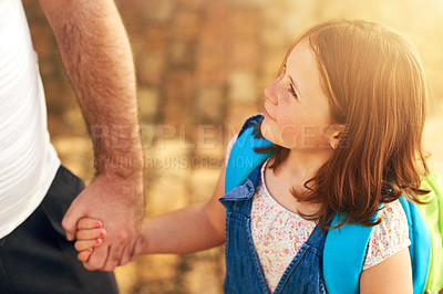 Buy stock photo Morning, holding hands and parent with kid to school for learning, education and child development. Family, happy and father with girl with backpack walking to academy, class and preschool campus