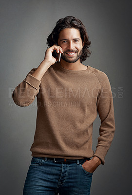 Buy stock photo Happy man, phone call and portrait in studio for communication and online or mobile app. Smile, male model and social media or internet for networking, connection and chat or talk by dark background