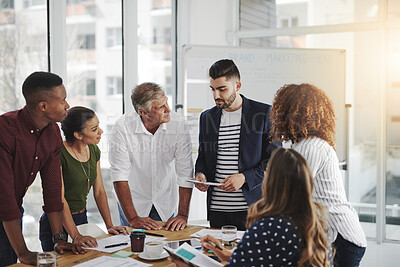 Buy stock photo Shot of creative employees working in a modern office