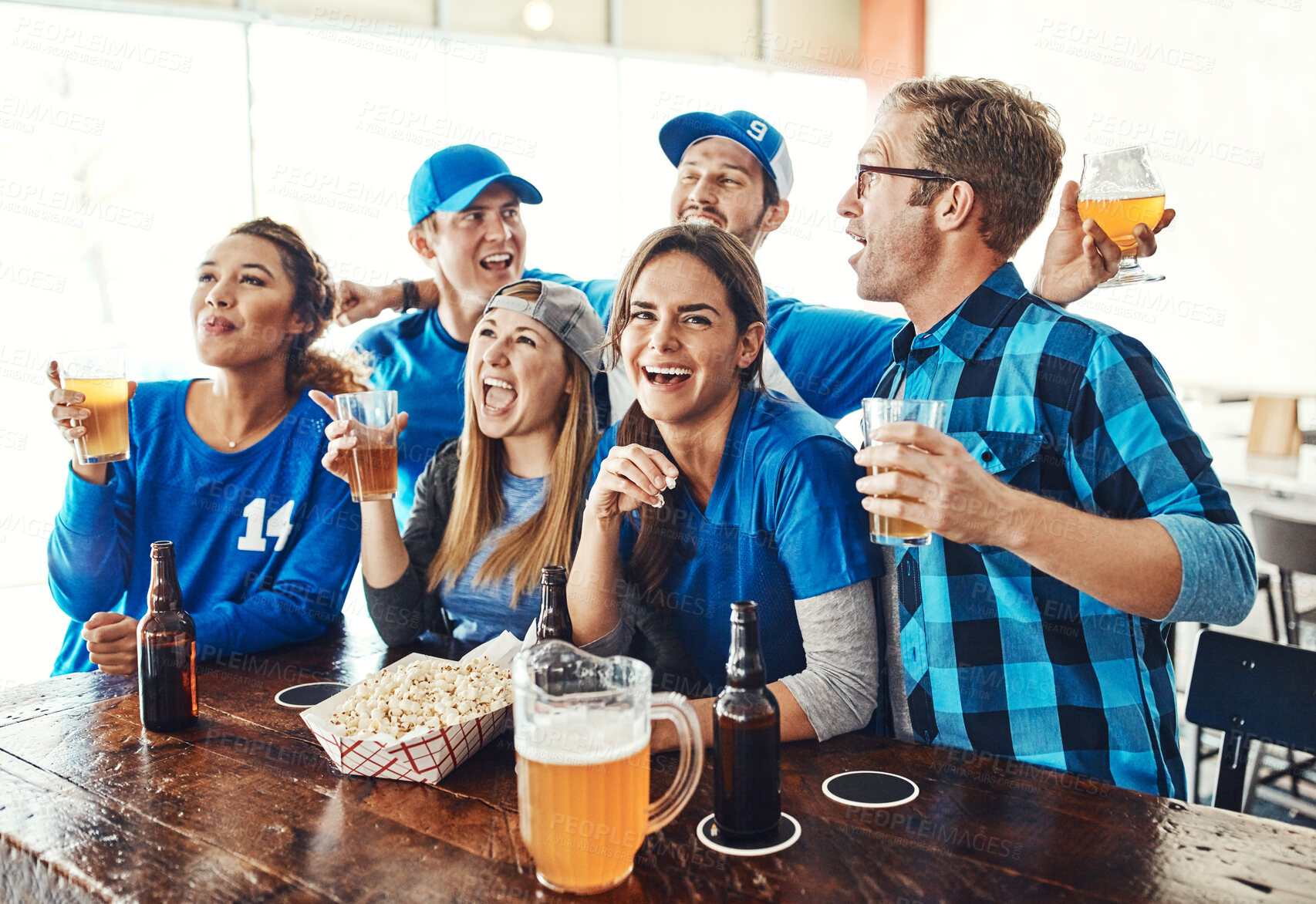 Buy stock photo Sports, fans and people in pub with solidarity, television and beer at broadcast of world cup together. Baseball, games and group of excited friends in bar for watch party, drinks and team support