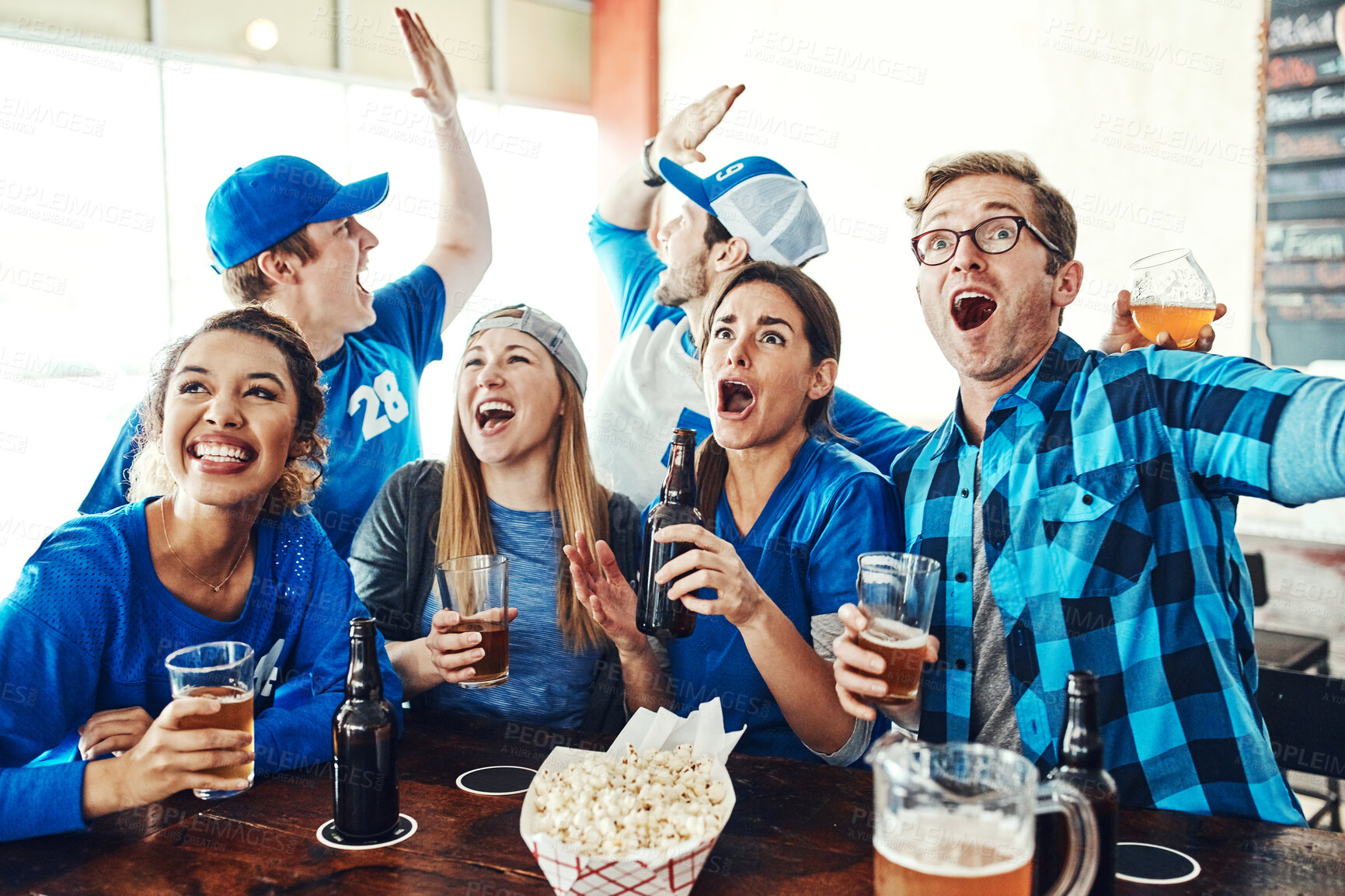 Buy stock photo Sports, celebration and people in pub with beer, television and fans at broadcast of world cup together. Baseball, games and group of excited friends in bar for watch party, drinks and team support