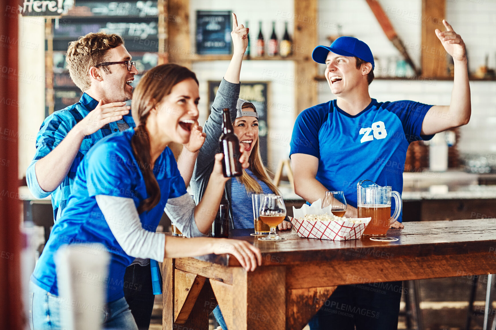 Buy stock photo Sports, celebration and friends in bar with beer, television and fans at broadcast of world cup together. Baseball, games and group of excited people in pub for watch party, drinks and team support