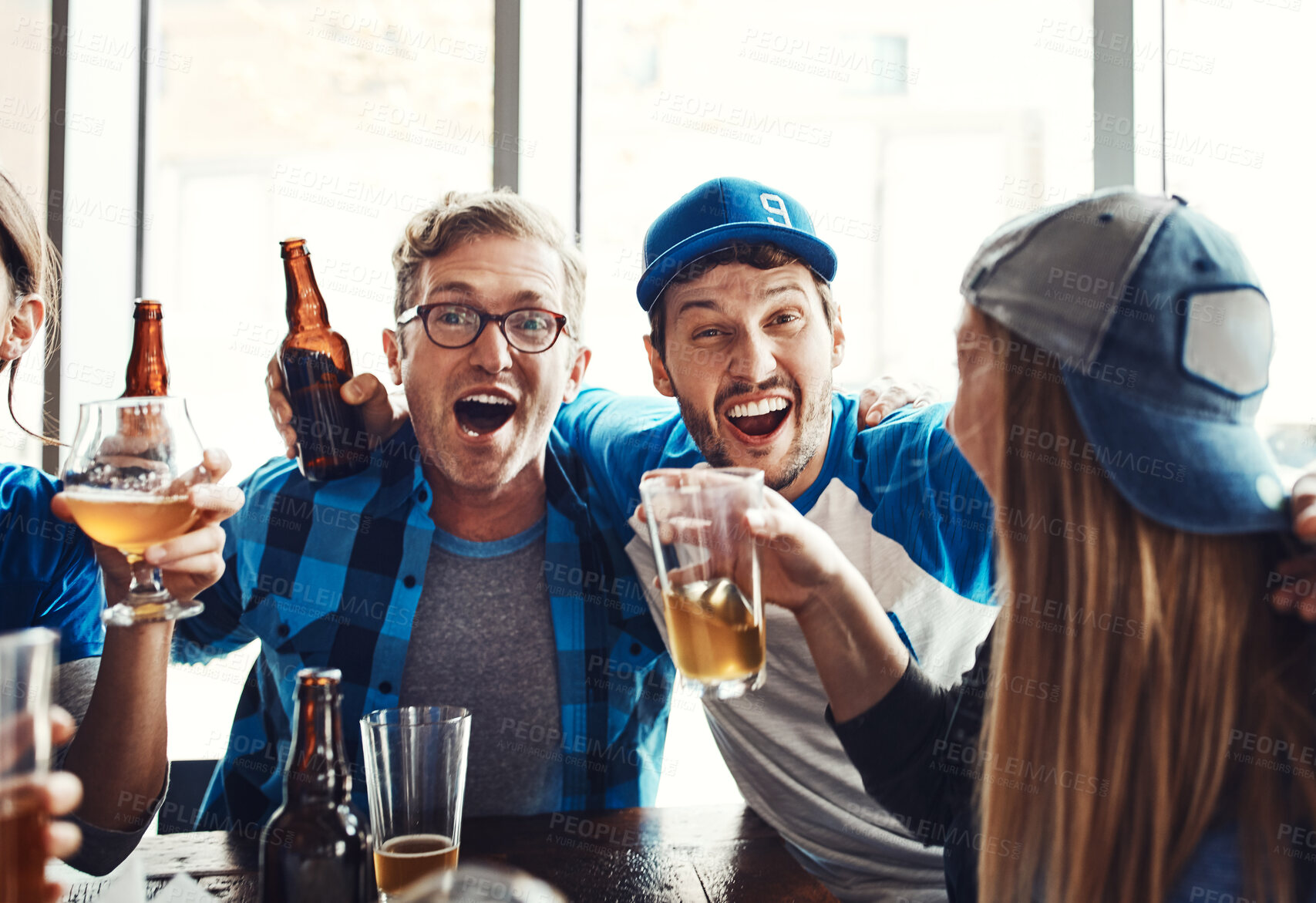 Buy stock photo Sports, fans and excited with beer for celebration, support and people watching tv team game in restaurant. Friends, drinks and live streaming with happiness, cheering and pride for baseball win