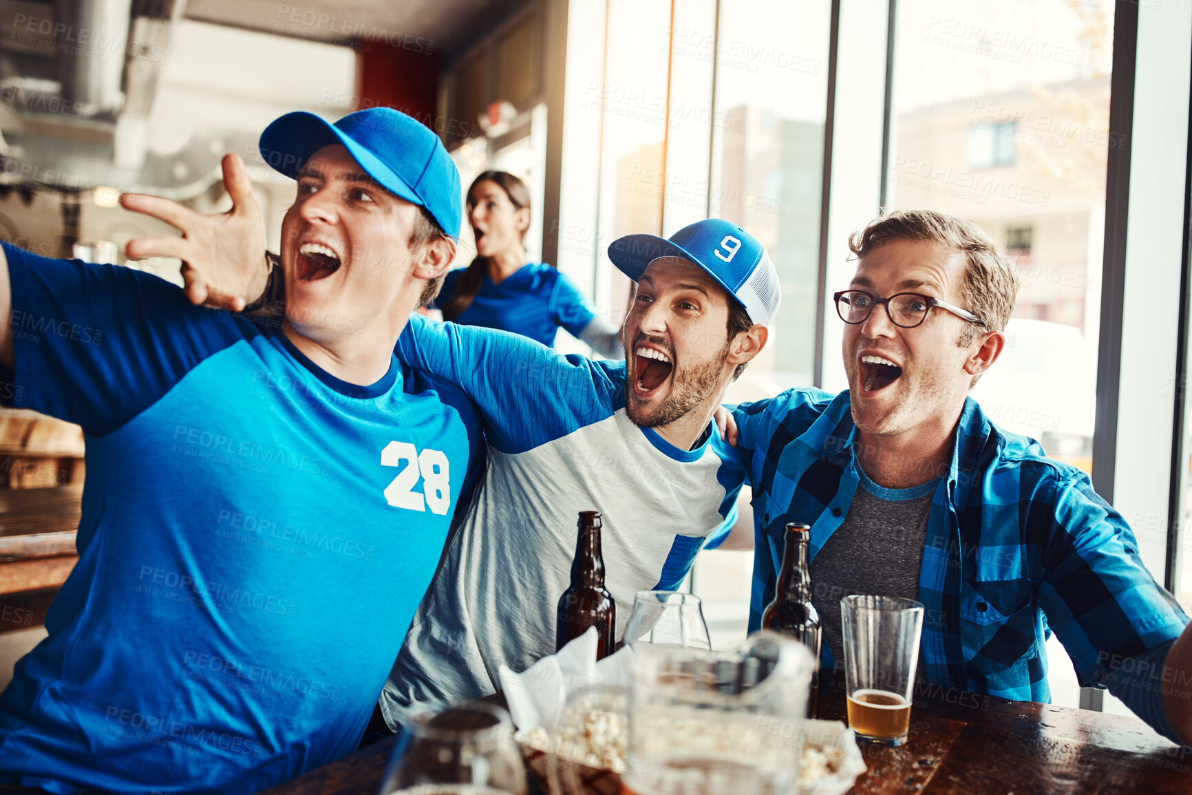 Buy stock photo People, supporters and winning team at pub, cheering for victory in sports on television with celebrating goal. Group, fans and beer for soccer challenge or match as friends with loyalty in world cup