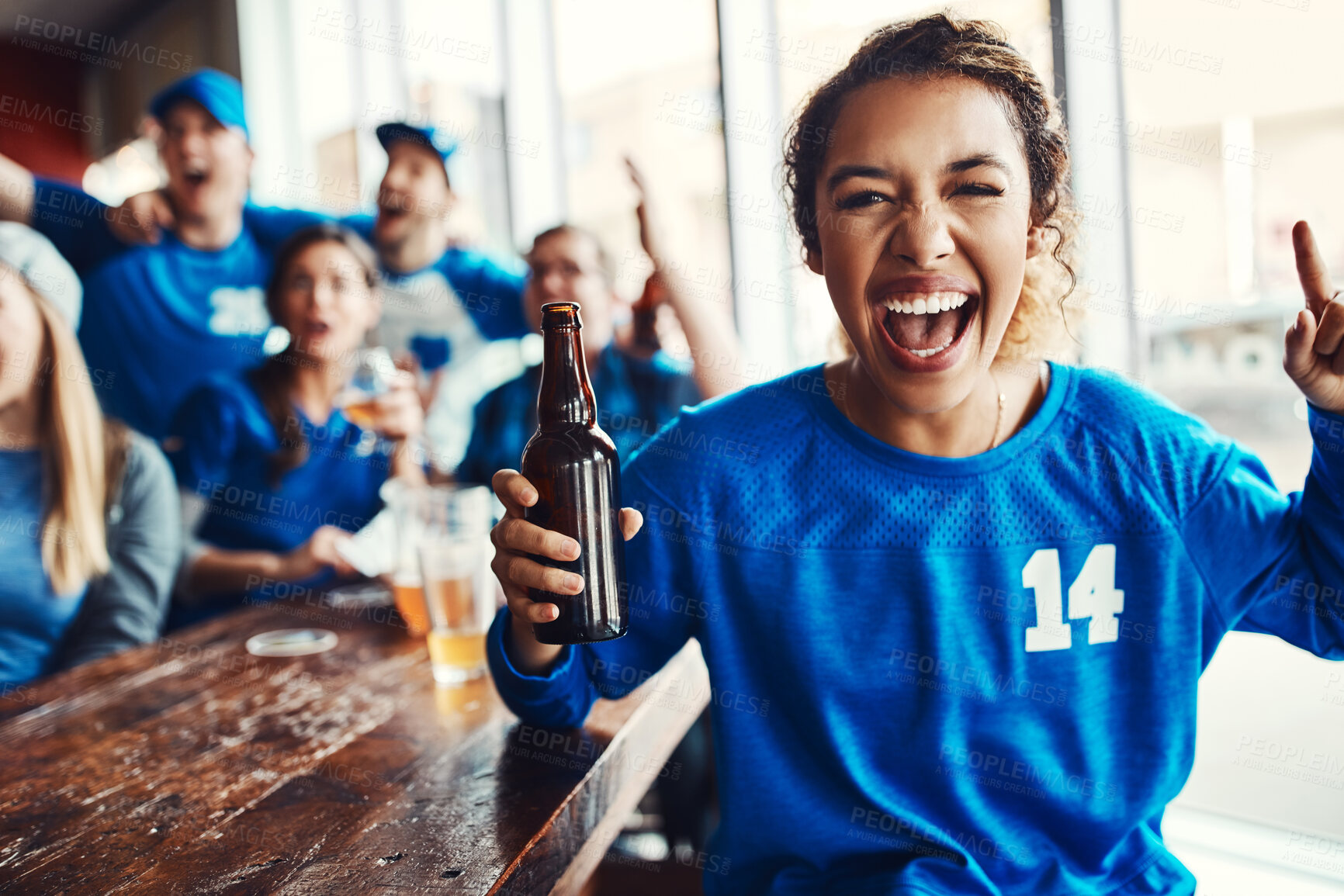 Buy stock photo Woman, supporter and portrait at pub, celebrating for victory in sports on television with cheering for goal. Group, fans and beer for soccer, tournament or match as friends with loyalty in world cup