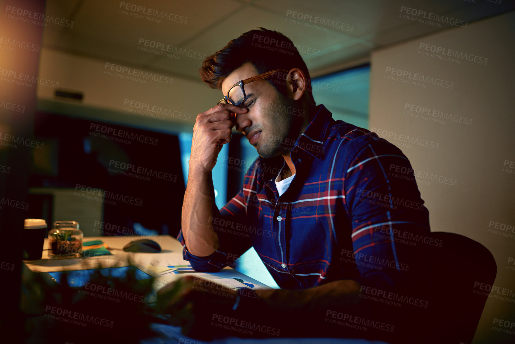 Buy stock photo Man, night and headache in office with burnout, frustrated and stress for deadline. Businessman, pain and tired at desk with mental health, exhausted or anxiety from mistake in project in evening