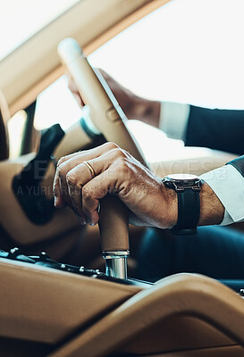 Buy stock photo Cropped shot of an unrecognizable man driving