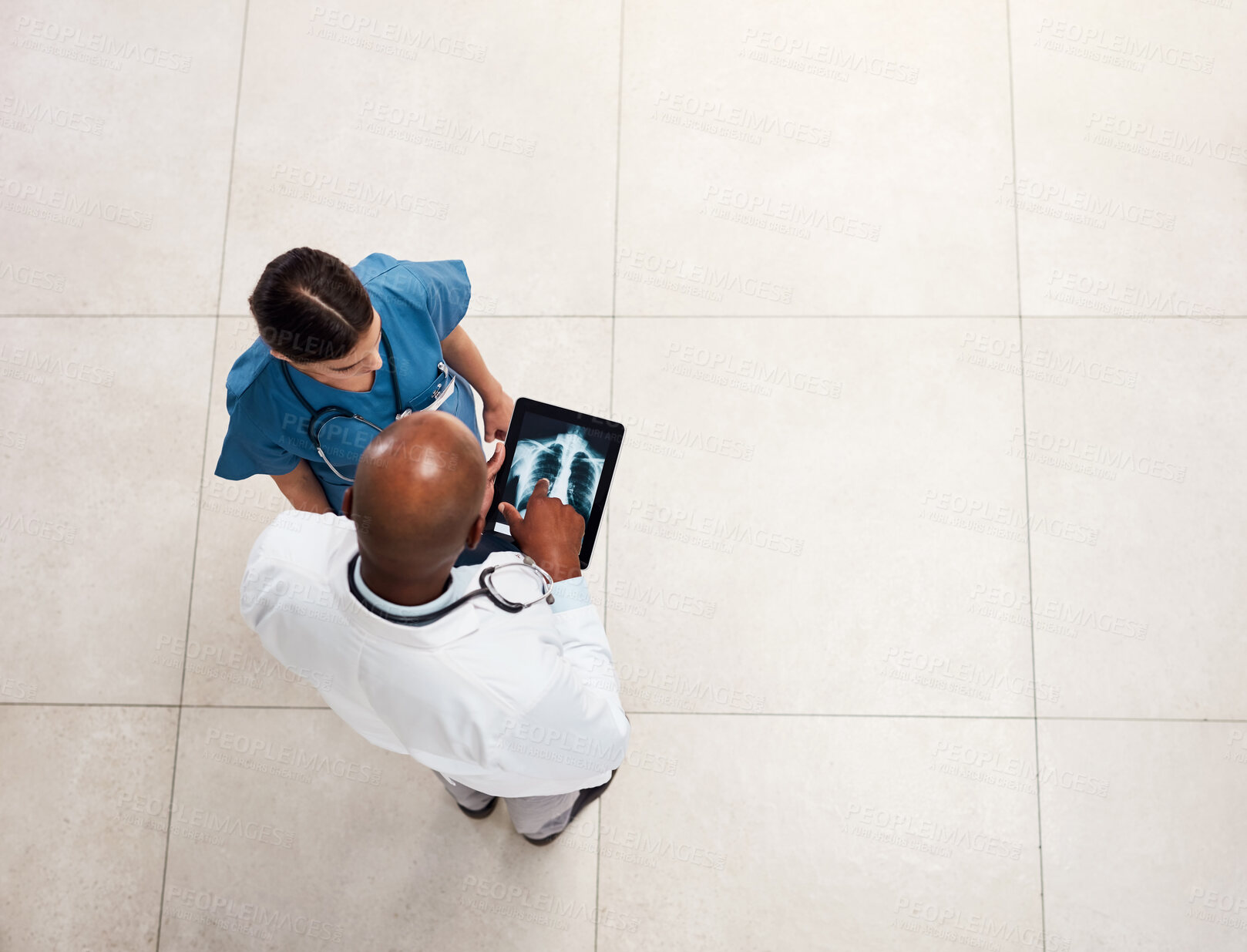 Buy stock photo Doctor xray and hospital with tablet, surgeon talk and medical collaboration for lung diagnosis. Above, digital and healthcare professional with tech and respiratory system check for cancer at clinic