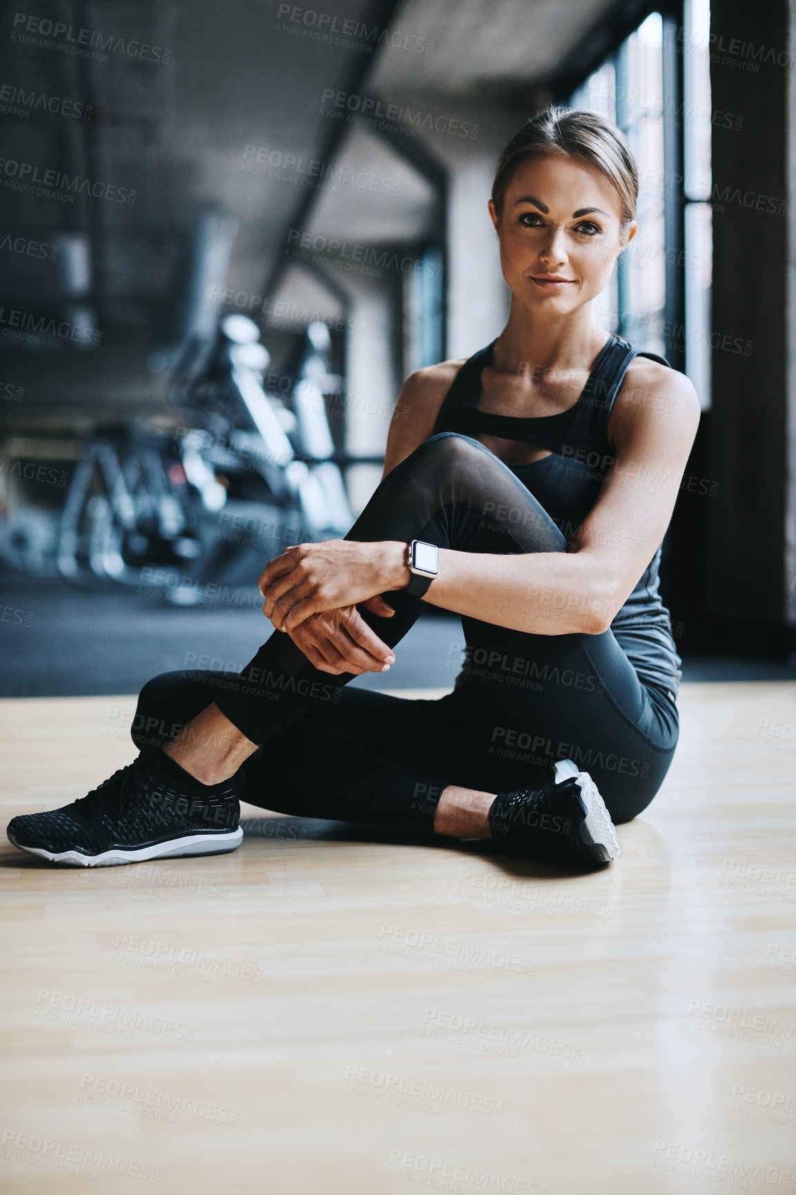 Buy stock photo Relax, fitness and portrait of woman in gym for training, exercise and cardio workout. Sports, athlete and person on floor for resting, recovery and on break for wellness, health and performance