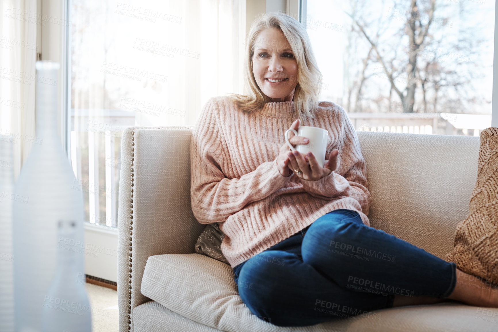 Buy stock photo Mature woman, thinking and espresso in home for peace, relax and hot beverage for memory on weekend. Female person, matcha and planning for retirement in living room, wondering and tea for comfort