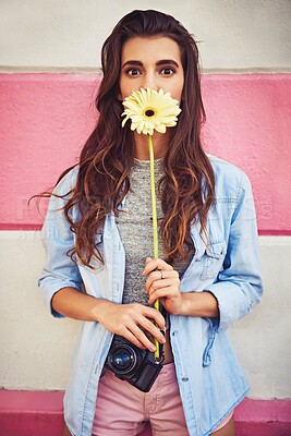 Buy stock photo Flower, portrait and woman in city for cosmetics, makeup or happiness by pink wall. Gen z, female person and plant in urban are for aesthetic, glow and wellness or eco friendly beauty for summer 