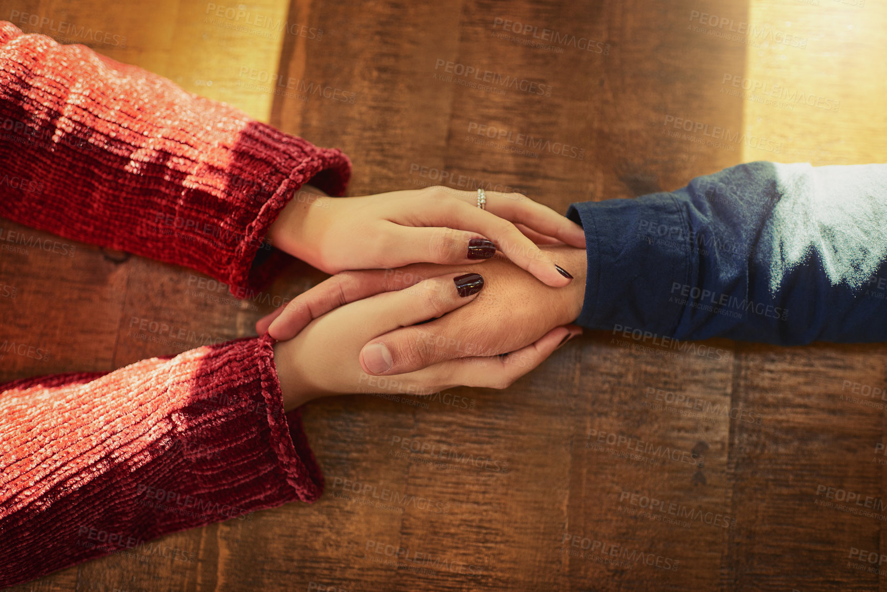 Buy stock photo Restaurant, table and people holding hands with love on anniversary, date and empathy with care. Above man, woman and couple with support, partnership and loyalty to commitment or travel for bonding