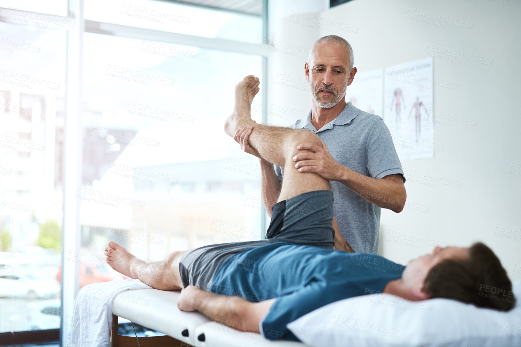 Buy stock photo Physiotherapy, men and client with leg injury, wellness and healing with service, stress relief and expert with skill. Consultation, physical therapist or customer with muscle health and recovery 