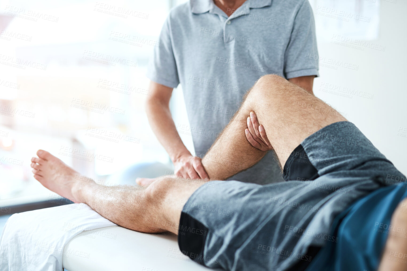 Buy stock photo Medical, knee and physiotherapist with man patient in clinic for healing, rehabilitation or treatment. Physical therapy, stretch and healthcare worker with athlete for leg injury or accident recovery