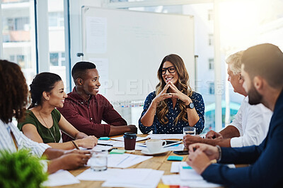 Buy stock photo Cropped shot of a group of creative employees working in a modern office