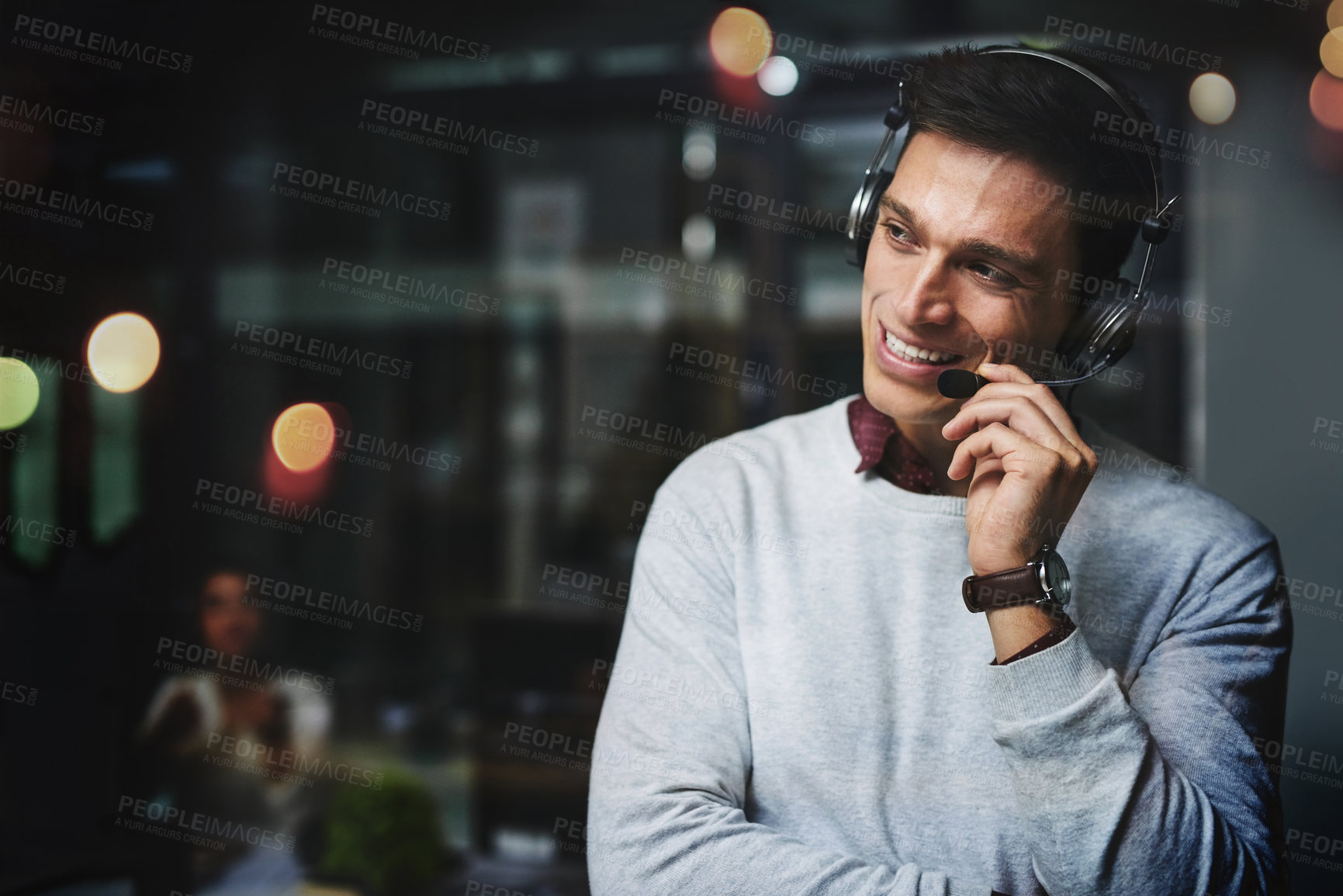 Buy stock photo Telemarketing, man and consultant with microphone for customer support with communication and FAQ service. Call center, agent and telecom advisory with headphones, mockup space and bokeh at night