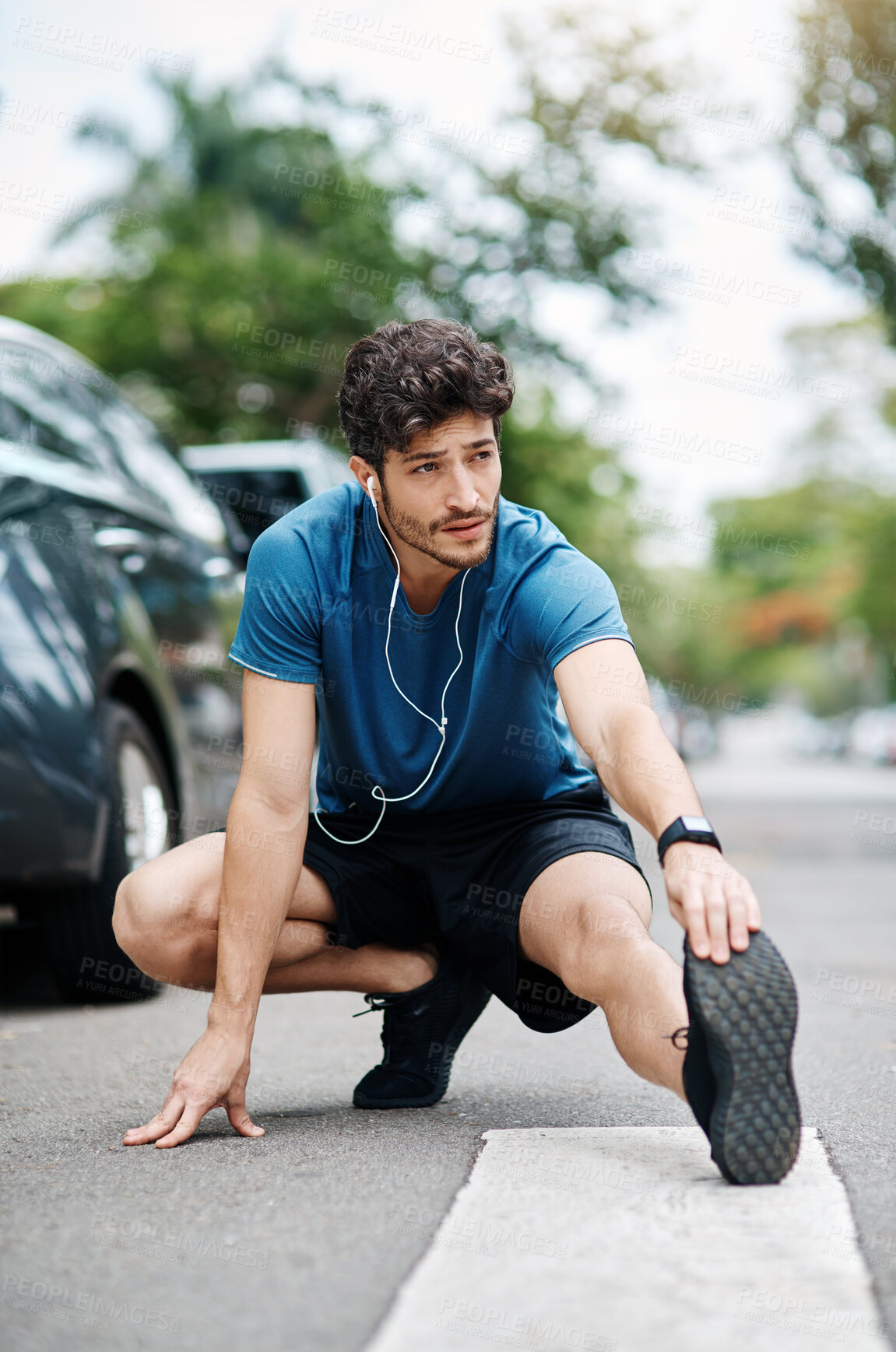 Buy stock photo Man, thinking and stretching legs for fitness, exercise and preparation to run marathon on road. Outdoor, male person and warm up before training, workout and music of runner for sports journey