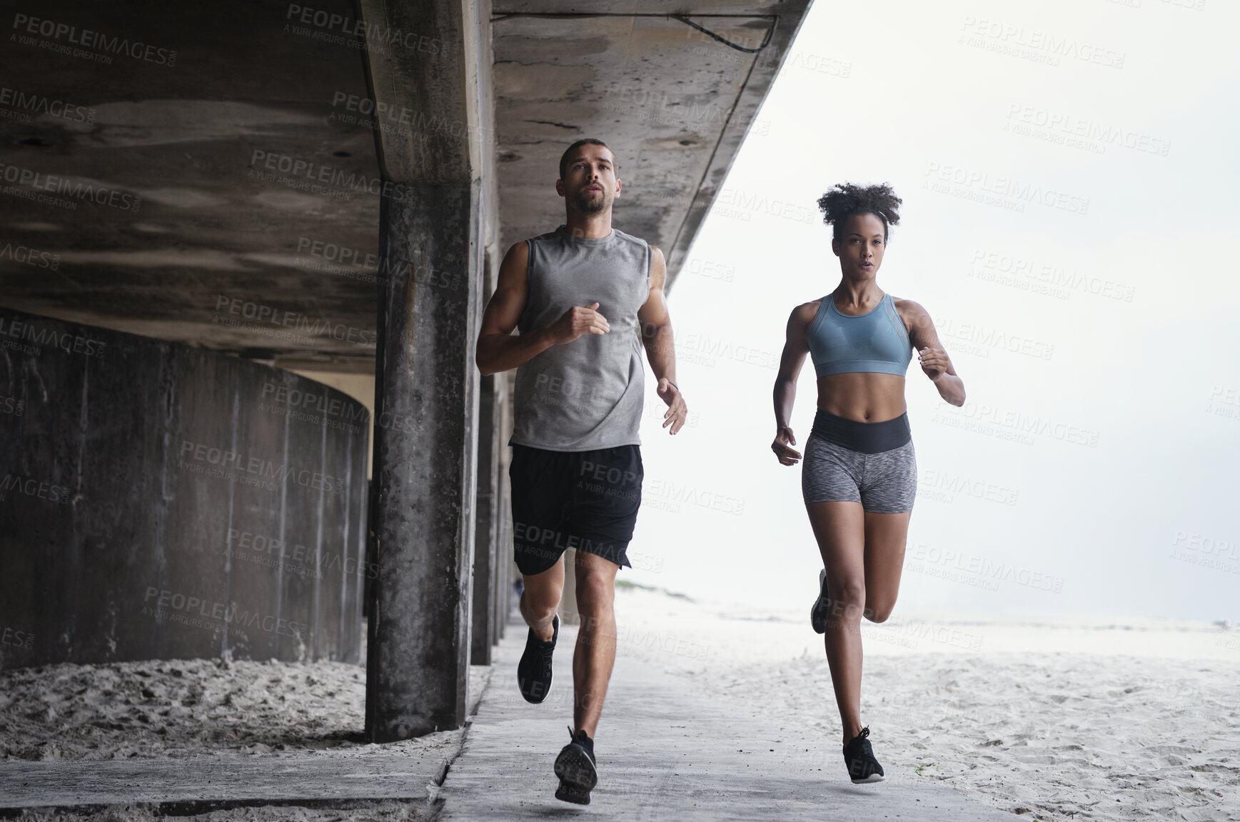 Buy stock photo Sports, running and people with speed at beach for workout, marathon training or endurance challenge. Fitness, wellness and athlete man with woman for morning cardio, energy or race in Brighton