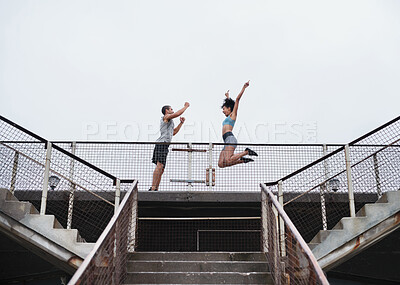 Buy stock photo Couple, celebration and exercise outdoor for fitness, wellness and accountability as relationship goals. Man, woman and workout by bridge with teamwork, training and freedom together for health