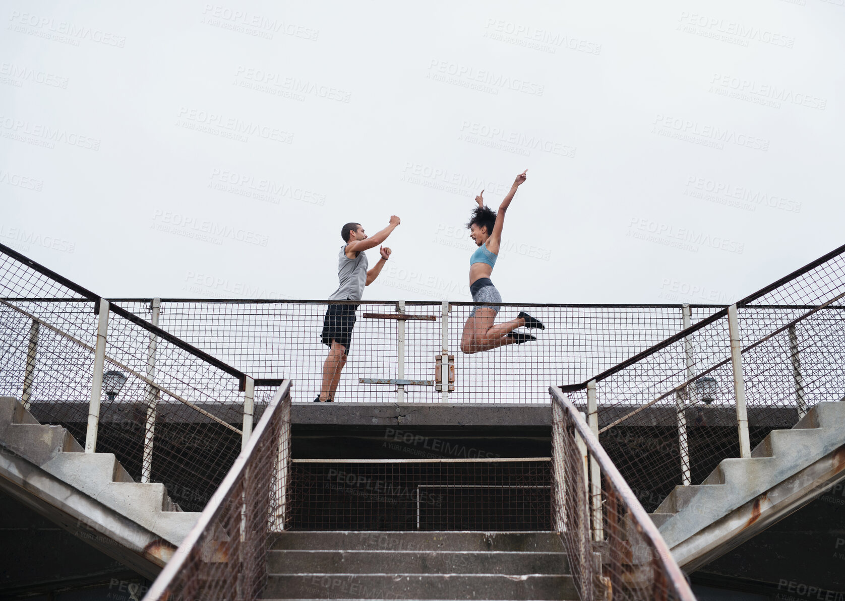 Buy stock photo Couple, celebration and exercise outdoor for fitness, wellness and accountability as relationship goals. Man, woman and workout by bridge with teamwork, training and freedom together for health