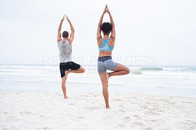 Buy stock photo Back, people and yoga on beach with balance, calm or wellness for mindfulness, wellbeing or health. Couple, outdoor and together in session for physical activity, spiritual practice and stretching