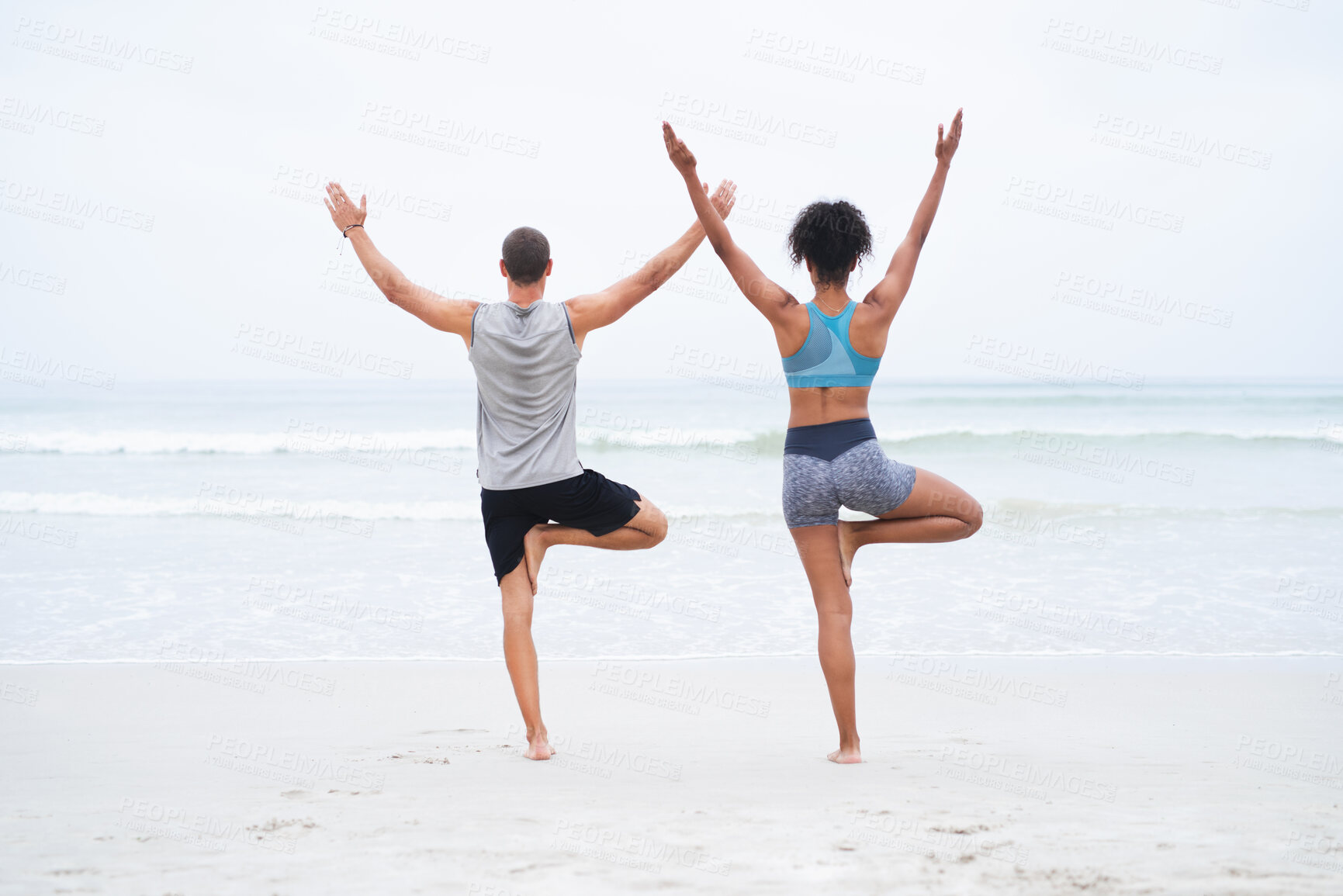 Buy stock photo Couple, yoga and back with meditation, balance and wellness for mindfulness, wellbeing and health. Woman, man and beach with together, session and activity for practice, stretching and zen for peace