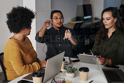 Buy stock photo Business people, meeting and planning with tech in office for programming, internship and advice. Creative, diversity and developer with laptop for software development, mentorship or progress report