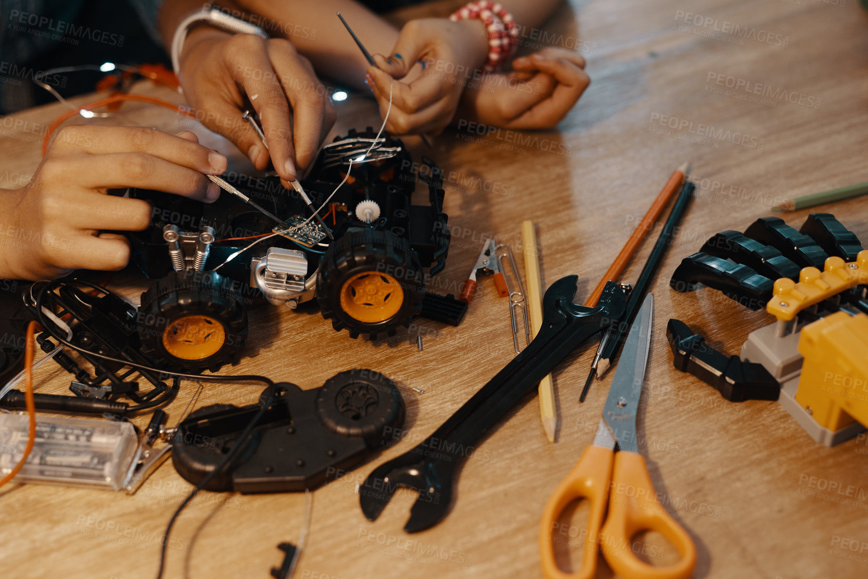Buy stock photo Kids, hands and car robotics for education with machine learning, developing and study of electronic transport. Boy, girl and vehicle engineering for creative toys, circuit building or tools at house