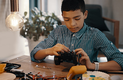 Buy stock photo Boy, remote and car robotics for education with machine learning, developing and study of electronic transport. Child, vehicle and creative engineering for stem toys, circuit building and house tools