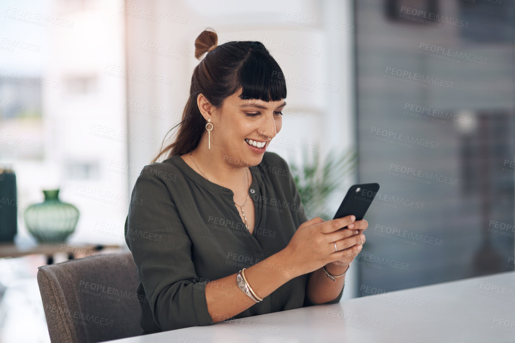 Buy stock photo Woman, phone and texting with smile in office for contact, networking or communication at startup. Person, employee and happy with smartphone for notification, deal or email with typing at workplace