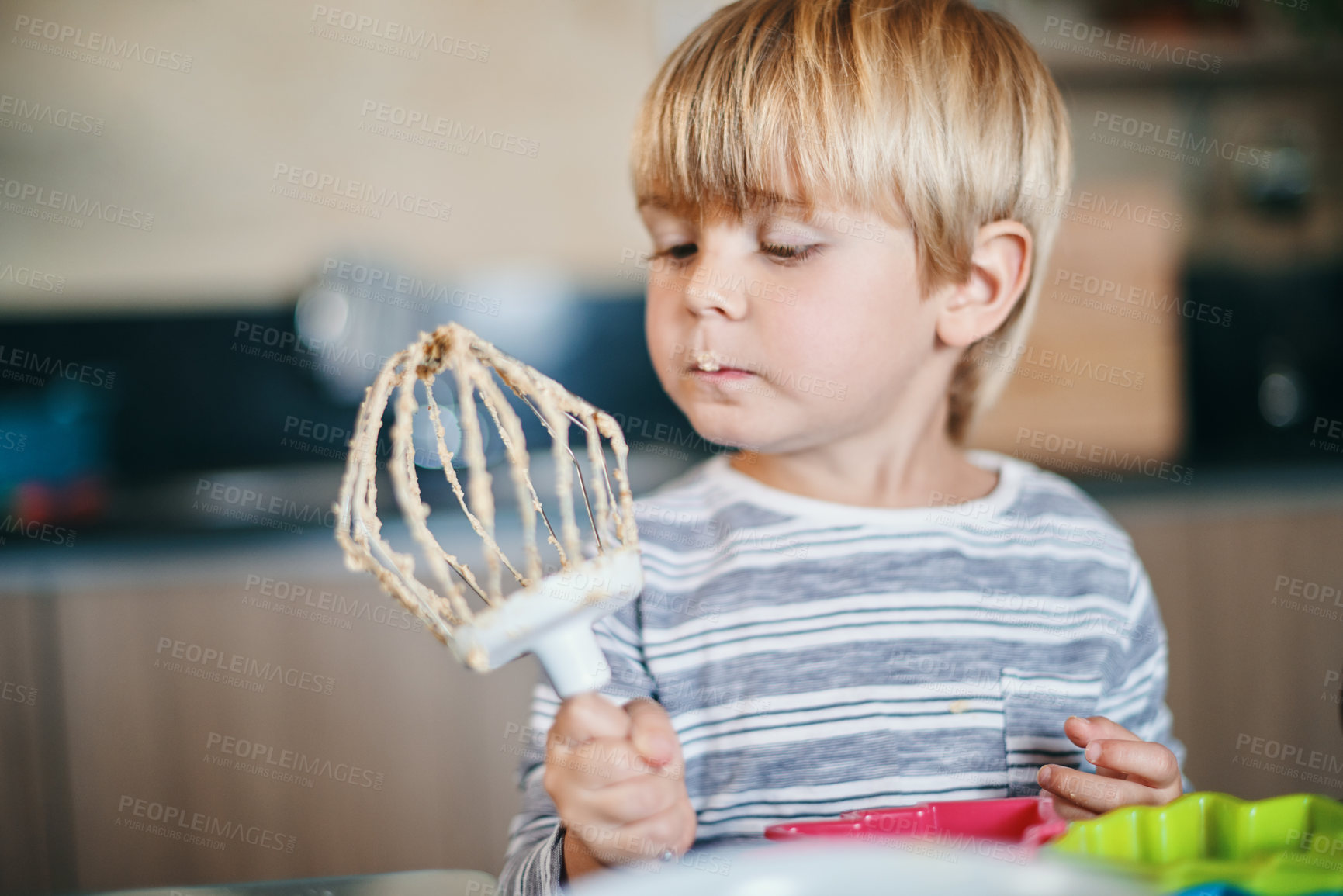 Buy stock photo Boy, child and dough with cooking, mixer and thinking in kitchen for cake, dessert or cookies in home. Kid, baking and eating in family house for learning with idea, food and development in Berlin