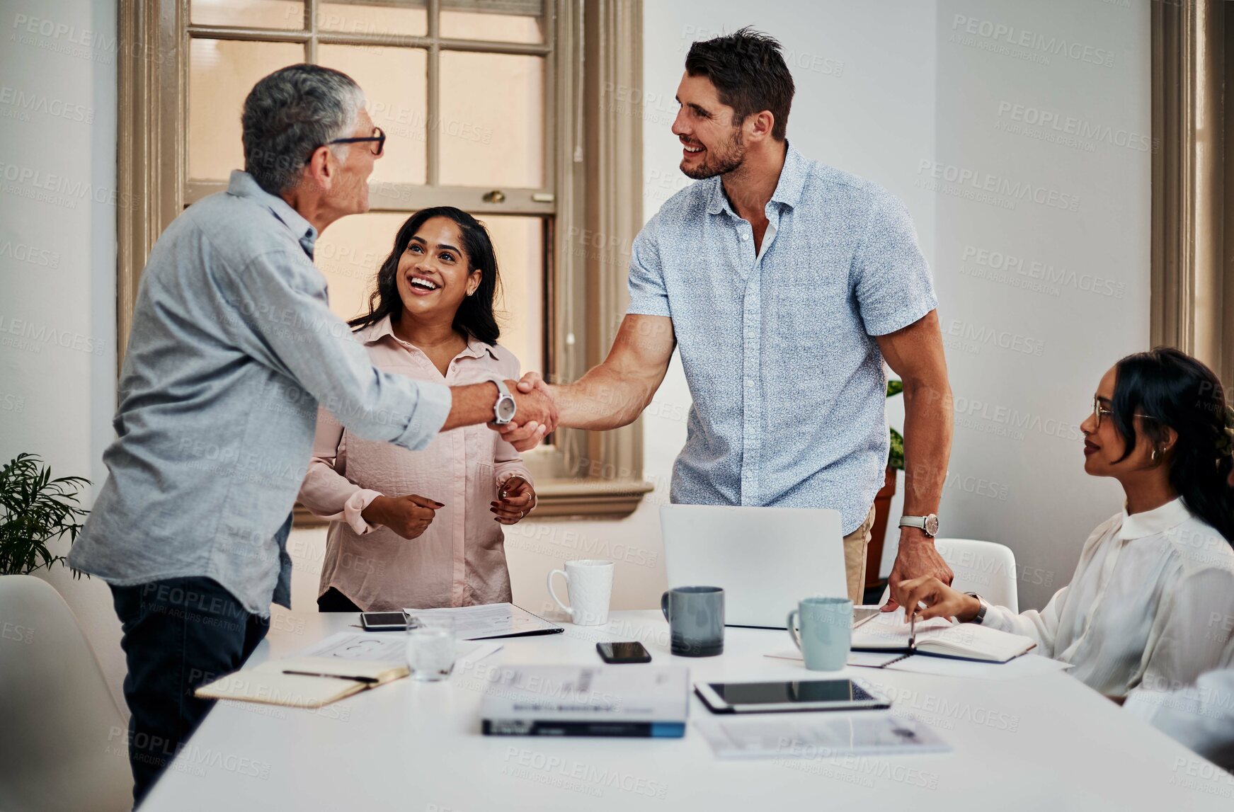 Buy stock photo Business people, men and shaking hands at meeting with welcome at startup with respect in office. Team, introduction and diversity with kindness, partnership and hello with smile at creative agency