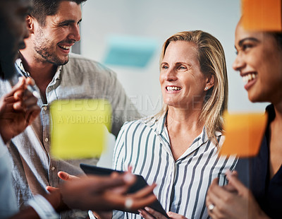 Buy stock photo Business people, glass wall and tablet for planning strategy, vision and ideas for project management. Mature mentor, manager and sticky note collaboration with tech for review, feedback or good news