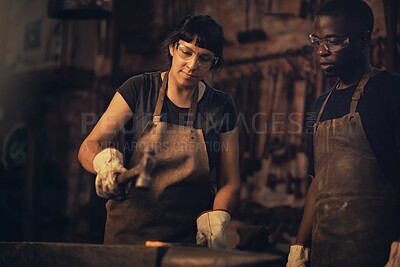 Buy stock photo Welding, confident and woman with smile, workshop and proud of gender equality in foundry and blacksmith. Hardworking, apron and manufacturing in factory, people and skills for collaboration with man