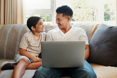 Buy stock photo Dad, boy and smile with laptop on sofa for streaming cartoon movies, entertainment videos and bonding. Father, child and relax in living room of home with technology for online gaming and connection.