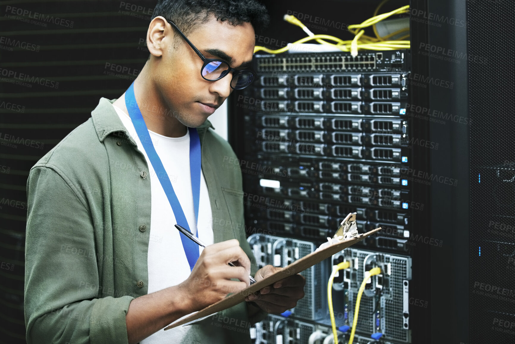 Buy stock photo Data center, man and computer engineer with checklist, writing and notes as programmer. Male person, inspection and technology for hardware, security and server room for system update or maintenance