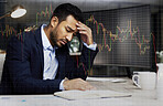 Businessman with depression analysing the stock market and trading during a financial crisis. Stressed trader in a bear market, looking at stocks crashing. Market crash and economy failure