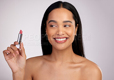 Buy stock photo Thinking, beauty and woman in studio with lipstick for cosmetics, confidence or makeup on white background. Product, aesthetic and happy model with ideas for satisfaction, memory or salon treatment