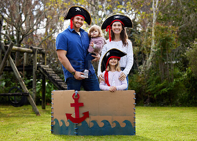 Buy stock photo Portrait, pirate and parents with children in park for playing, pretend games and creative fun. Family, happy and mom, dad and girls for bonding, relax and adventure in fantasy, boat and costume