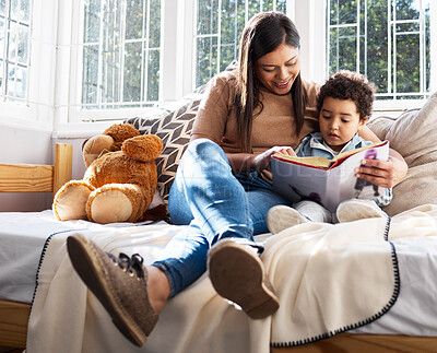 Buy stock photo Reading, mom and kid in bedroom with story for teaching, learning and happy family bonding in home. Bed, mother and boy relax together with book, care and morning storytelling for child development.