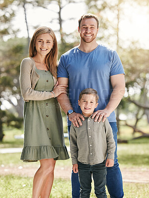 Buy stock photo Smile, nature and portrait of parents with child at outdoor park for connection on family holiday. Happy, hugging and boy with mother and father in field for bonding on vacation or trip in California