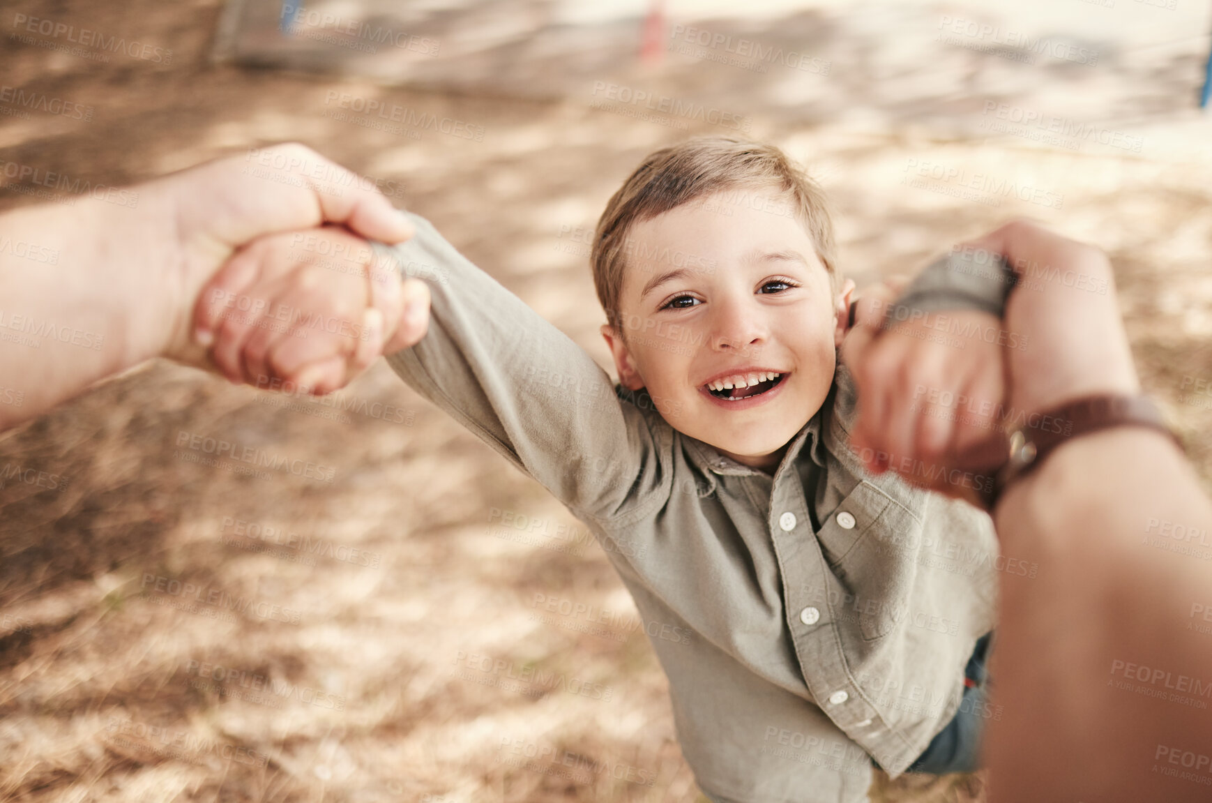 Buy stock photo Child, pov and spin portrait outdoor with speed, fast movement and hands for support, trust and bonding in park. Boy, excited kid and flying activity on playground with smile, enjoyment and freedom