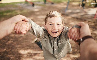 Buy stock photo Kid, pov and spin portrait outdoor with speed, fast movement and hands for support, trust and bonding in park. Boy, excited child and flying activity on playground with smile, enjoyment and freedom