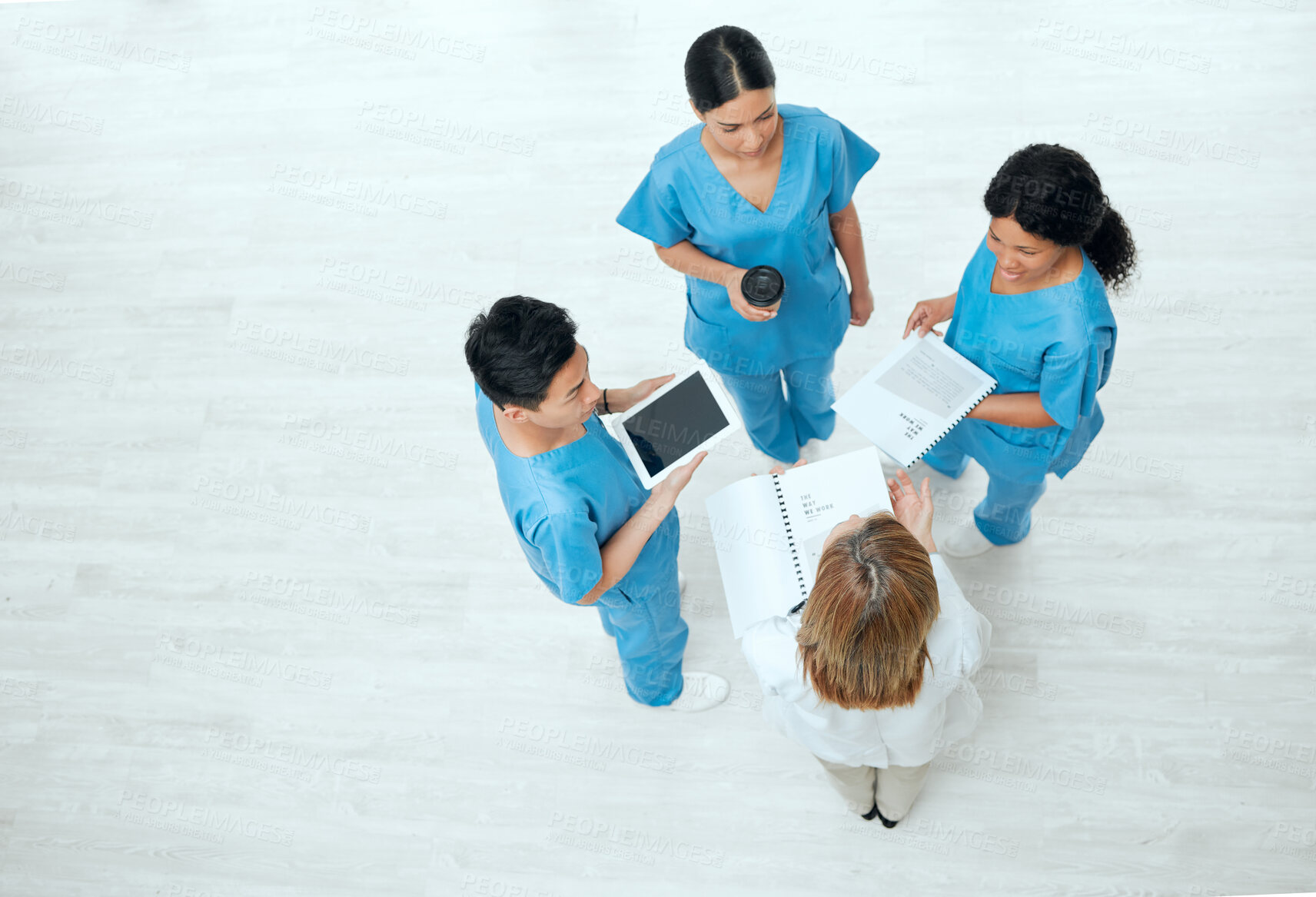 Buy stock photo Teamwork, tablet or above of nurses in meeting planning a surgery strategy in collaboration together. Top view of healthcare doctors talking or speaking of online news reports, feedback or research 